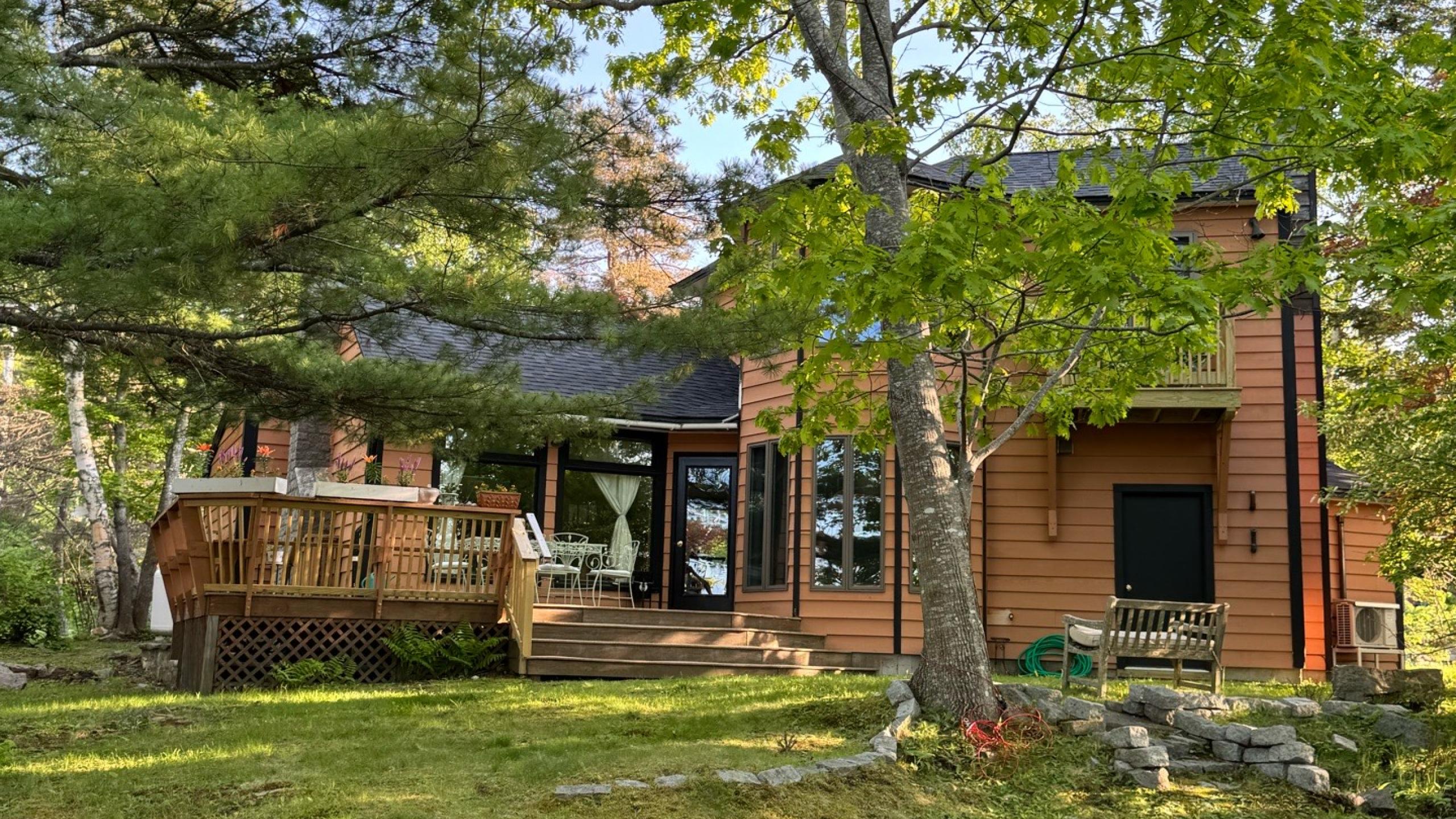 Back north elevation of window and fenestration of Maine home.