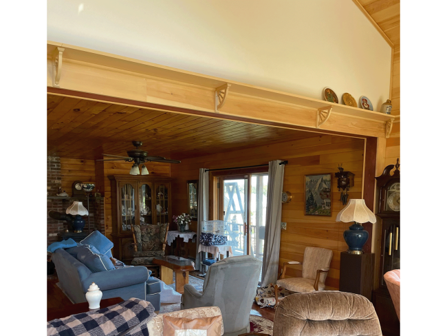 Wood trim along the ceiling in the living room