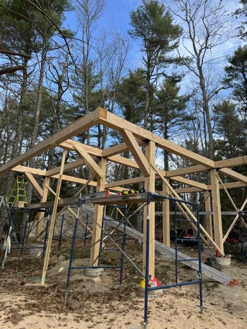 Ellsworth camp timber framing cabin construction inprogress.