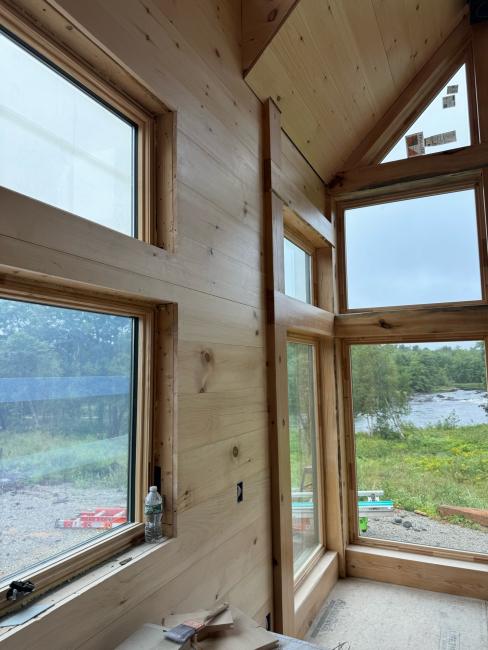 Views of Mount Desert Island landscape and natural light make this custom design feel like a the perfect getaway.