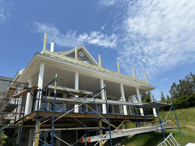 Building out this custom sunroom and patio addition.