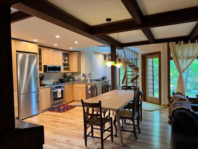 Kitchen remodel after with new appliances, plumbing, electrical, and floors.