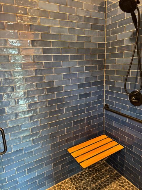 ADA shower with fold out seat installation.