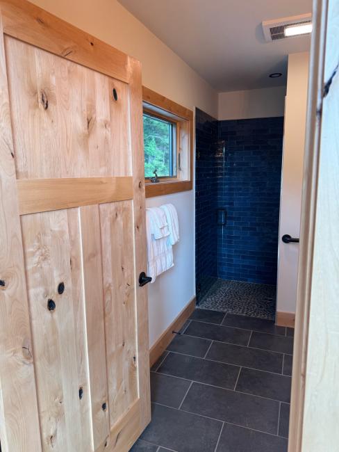 Bathroom with vibrant tile.