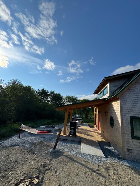 Finished view of the cabin deck from the driveway.