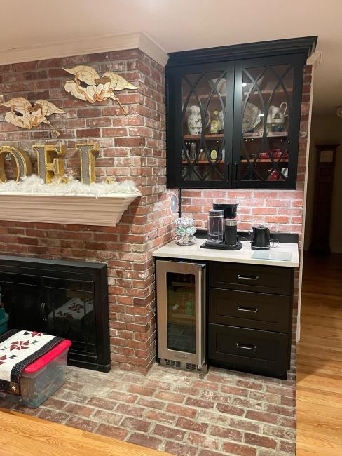 New bar with glass cabinet doors.