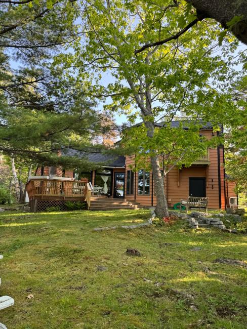 Back elevation of Maine home restoration project with new windows.